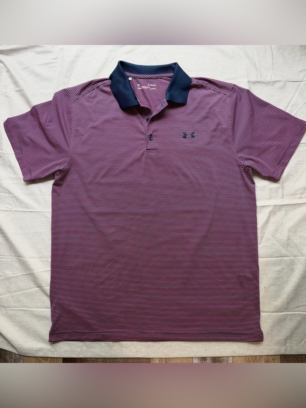 Under Armour Men’s Navy and Pink Striped Polo Shirt